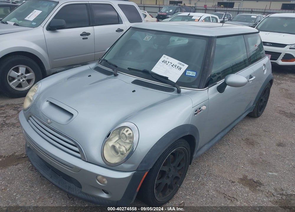 2005 MINI COOPER S VIN: WMWRE33595TL12001