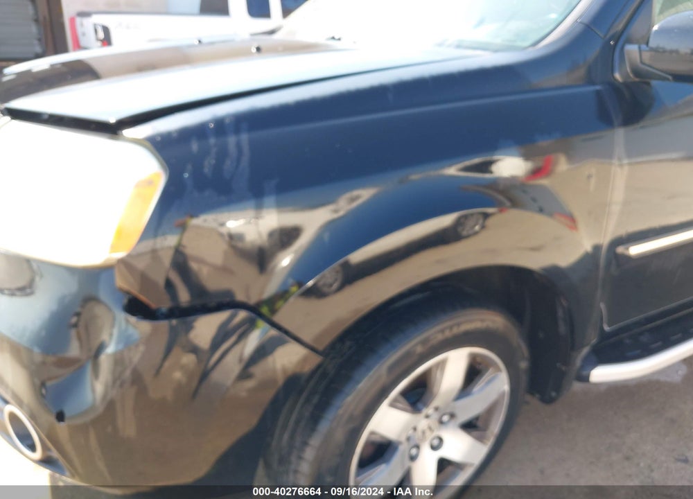 2012 HONDA PILOT VIN: 5FNYF4H95CB001209