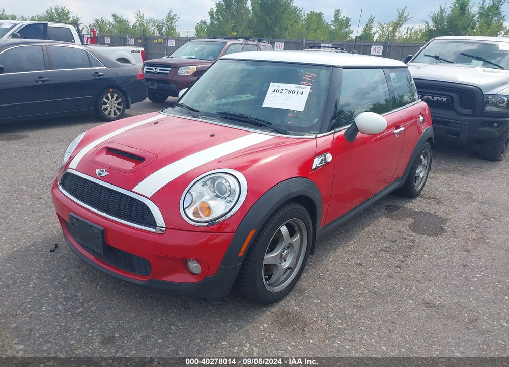 2007 MINI COOPER S VIN: WMWMF73547TL90333