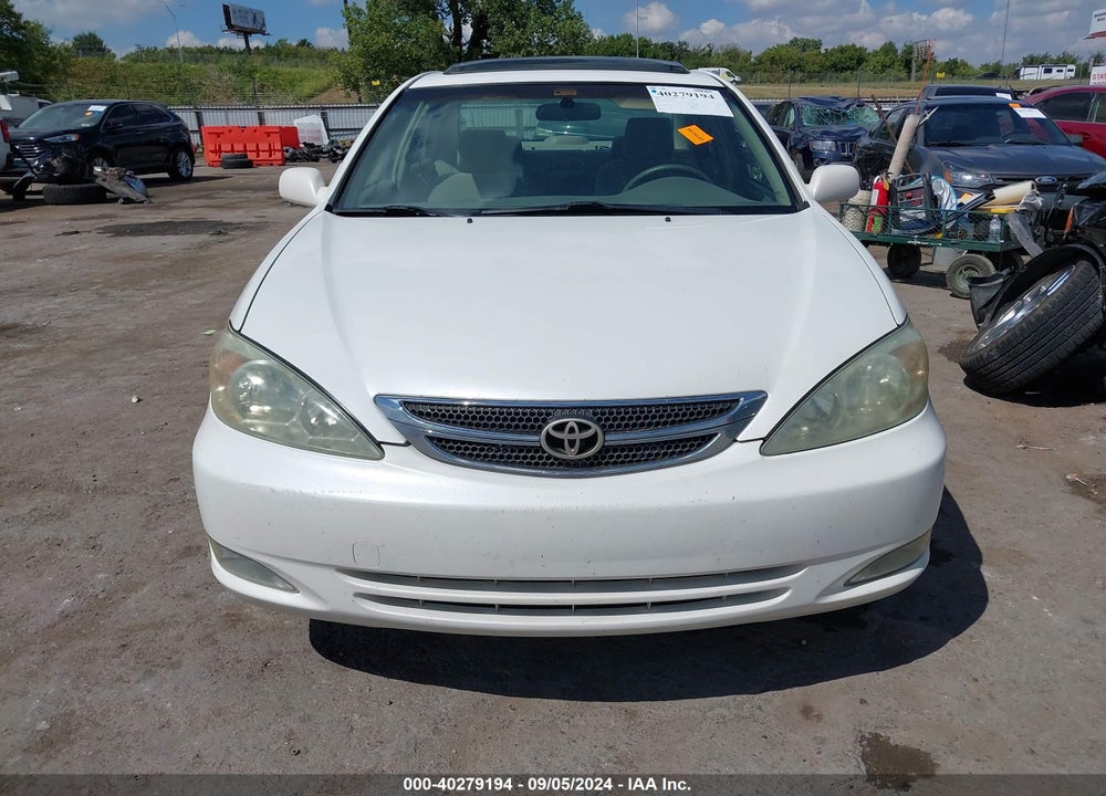 2004 TOYOTA CAMRY LE VIN: JTDBE32K340287186