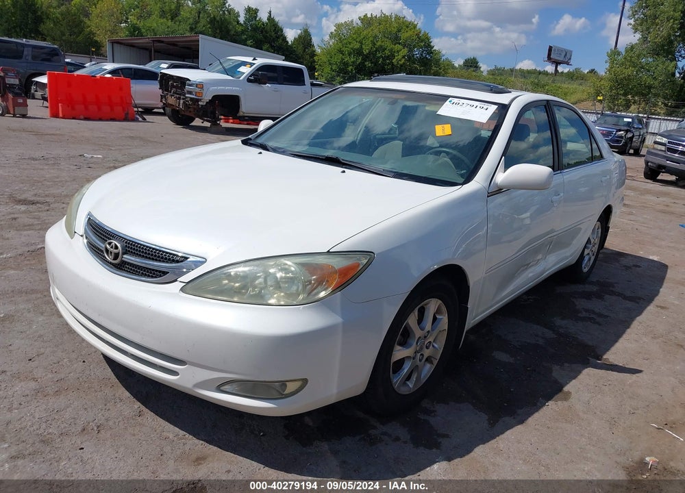 2004 TOYOTA CAMRY LE VIN: JTDBE32K340287186