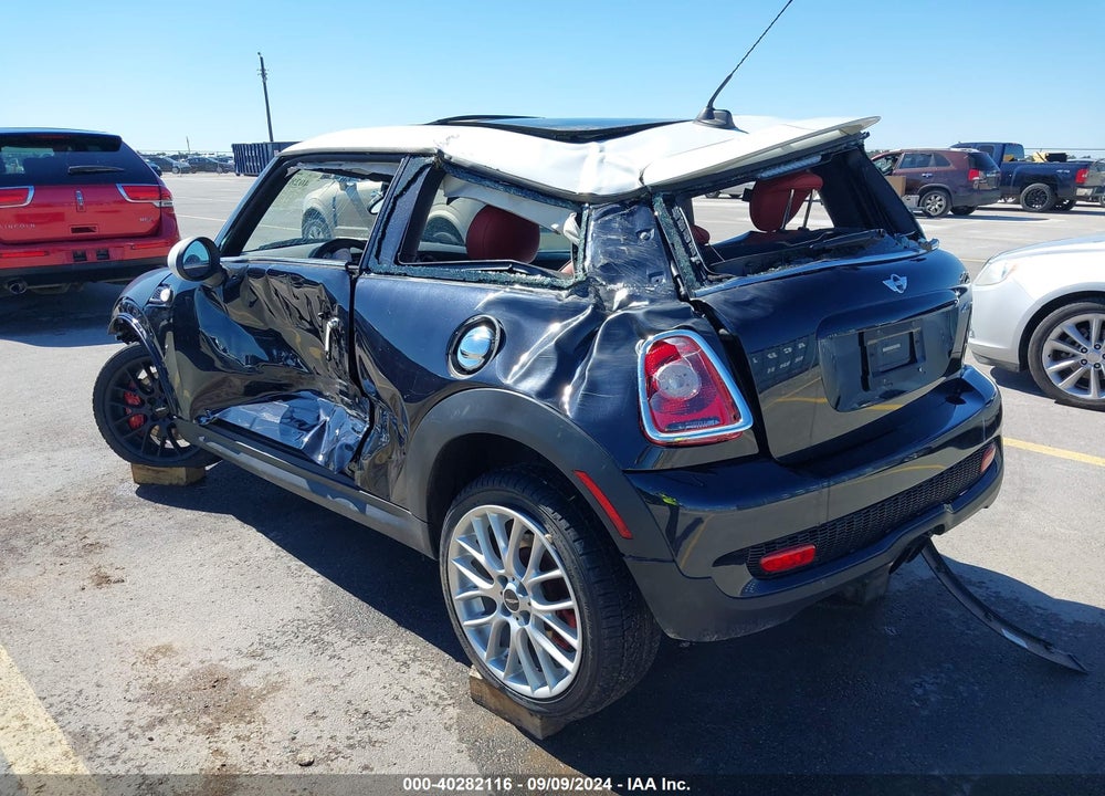 2009 MINI JOHN COOPER WORKS VIN: WMWMF93549TF96396
