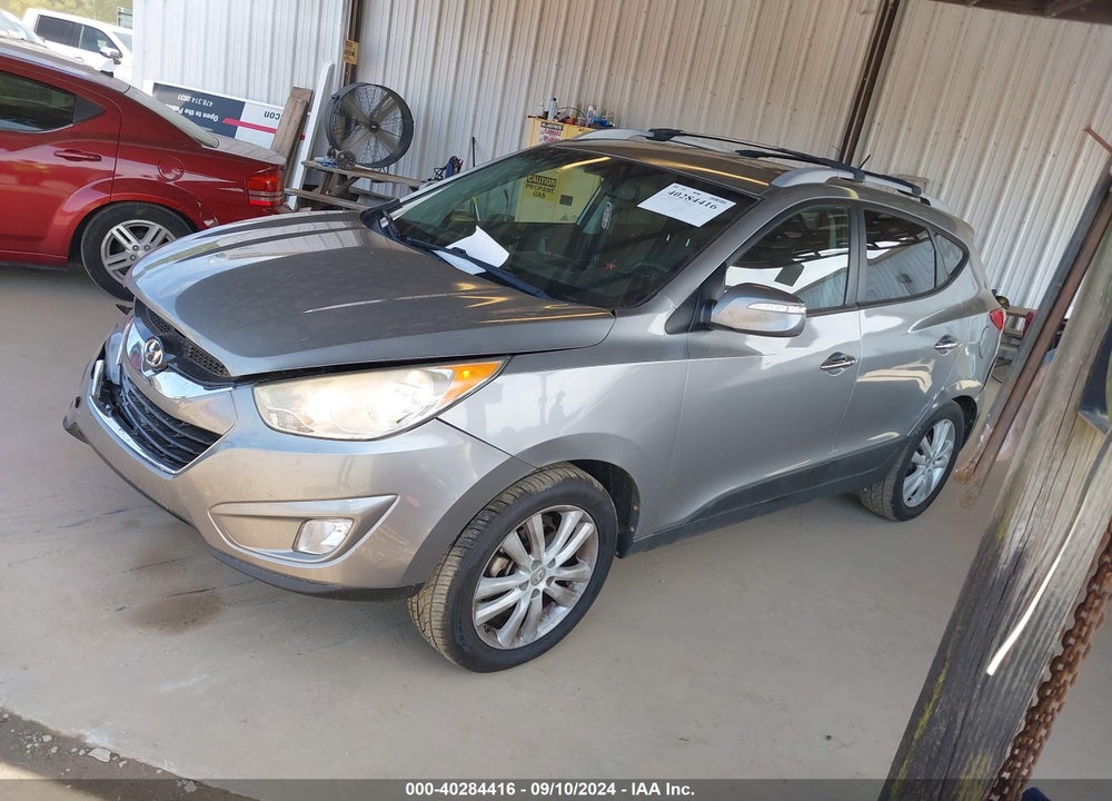 2013 HYUNDAI TUCSON LIMITED VIN: KM8JU3AC0DU670628