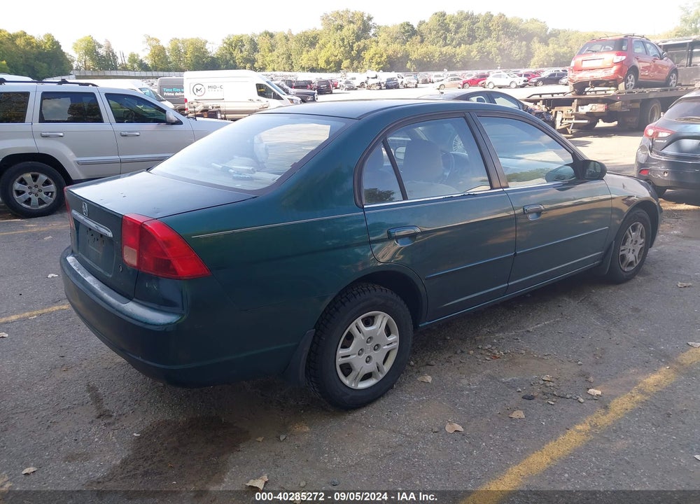 2002 HONDA CIVIC LX VIN: 1HGES165X2L074490
