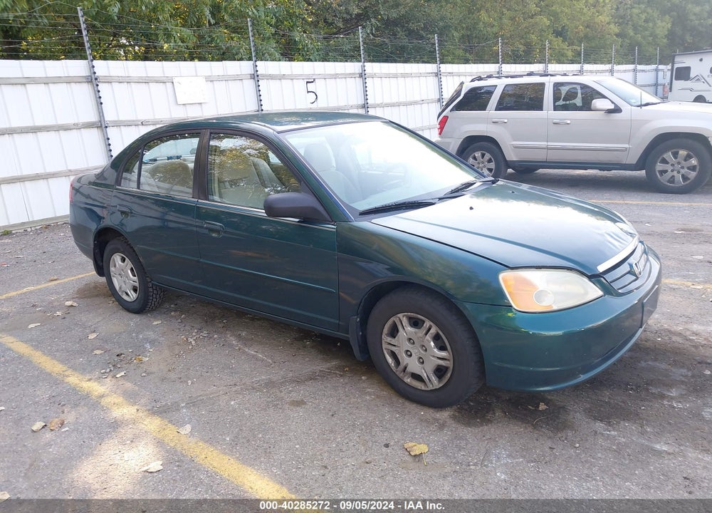 2002 HONDA CIVIC LX VIN: 1HGES165X2L074490