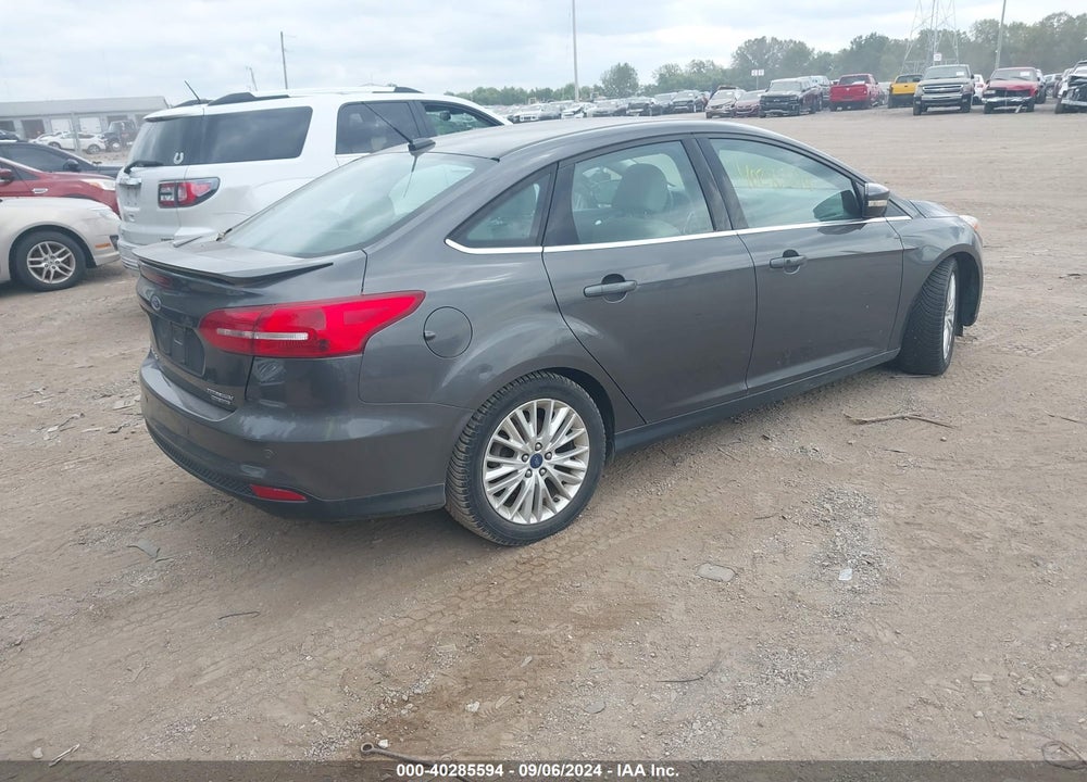 2015 FORD FOCUS TITANIUM VIN: 1FADP3J24FL322555