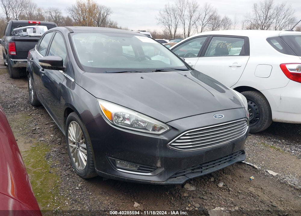 2015 FORD FOCUS TITANIUM VIN: 1FADP3J24FL322555