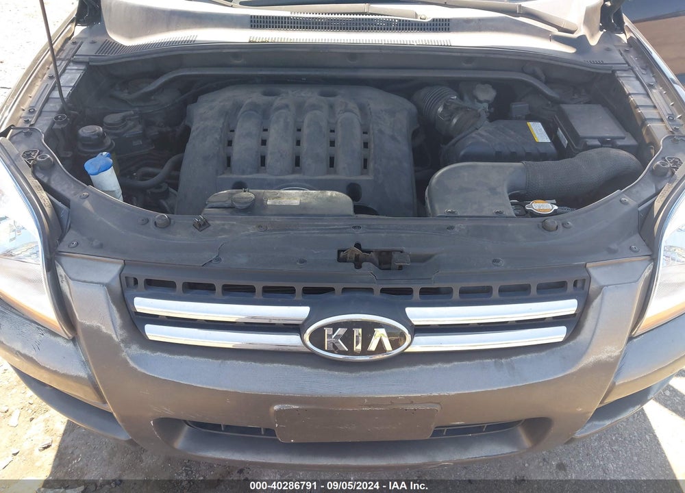 2007 KIA SPORTAGE VIN: KNDJE723777301016
