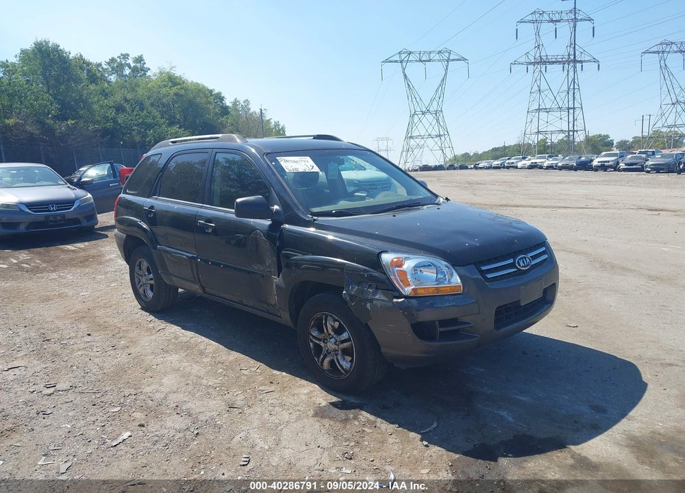 2007 KIA SPORTAGE VIN: KNDJE723777301016