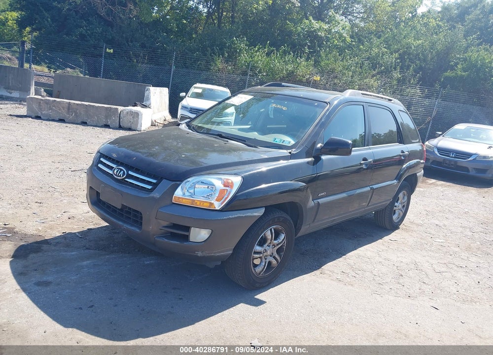 2007 KIA SPORTAGE VIN: KNDJE723777301016