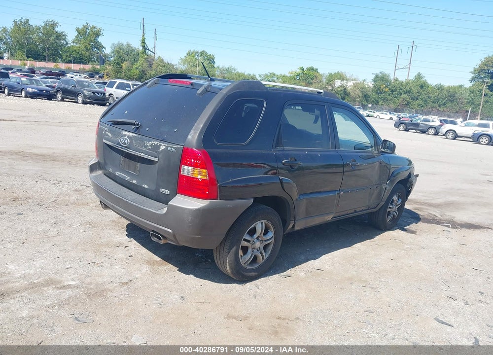 2007 KIA SPORTAGE VIN: KNDJE723777301016