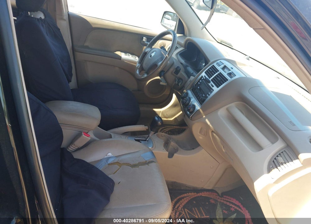 2007 KIA SPORTAGE VIN: KNDJE723777301016