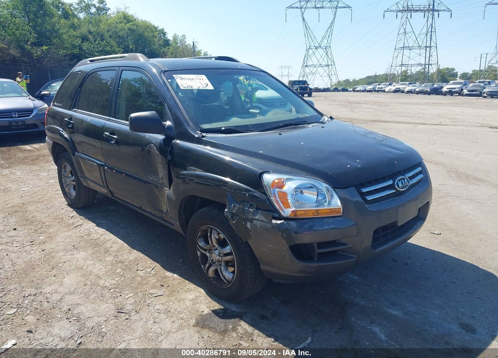 2007 KIA SPORTAGE VIN: KNDJE723777301016