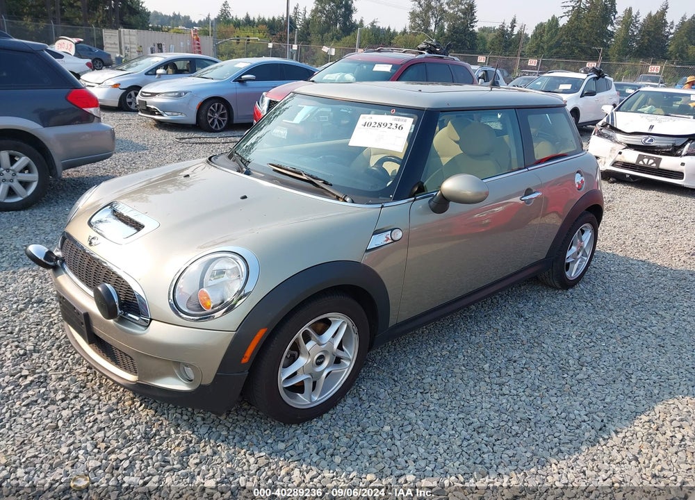 2010 MINI COOPER S VIN: WMWMF7C59ATZ69776