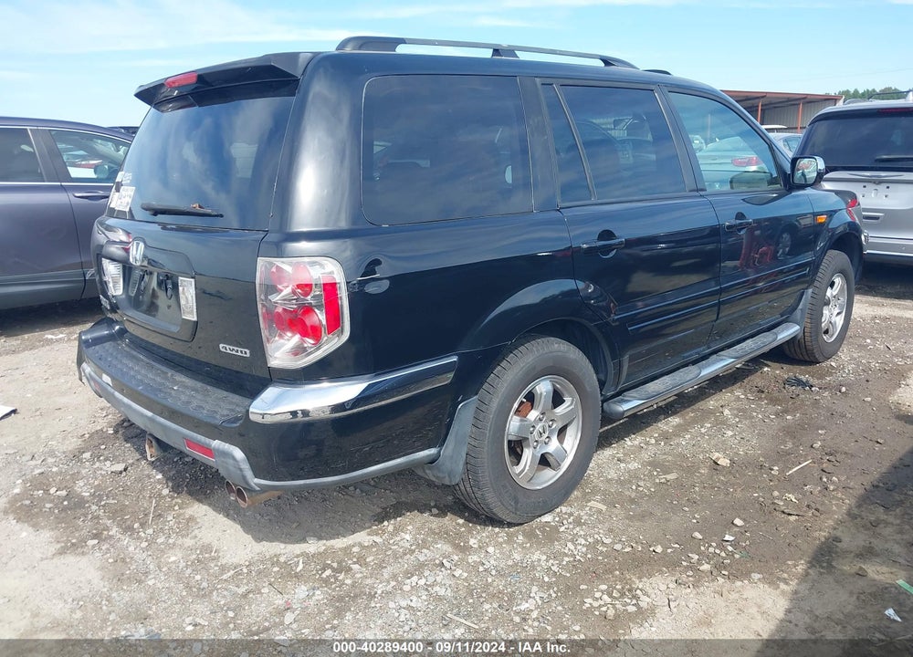 2006 HONDA PILOT EX-L VIN: 2HKYF18506H553377
