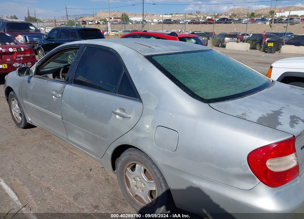 2003 TOYOTA CAMRY LE VIN: 4T1BF32K63U052457