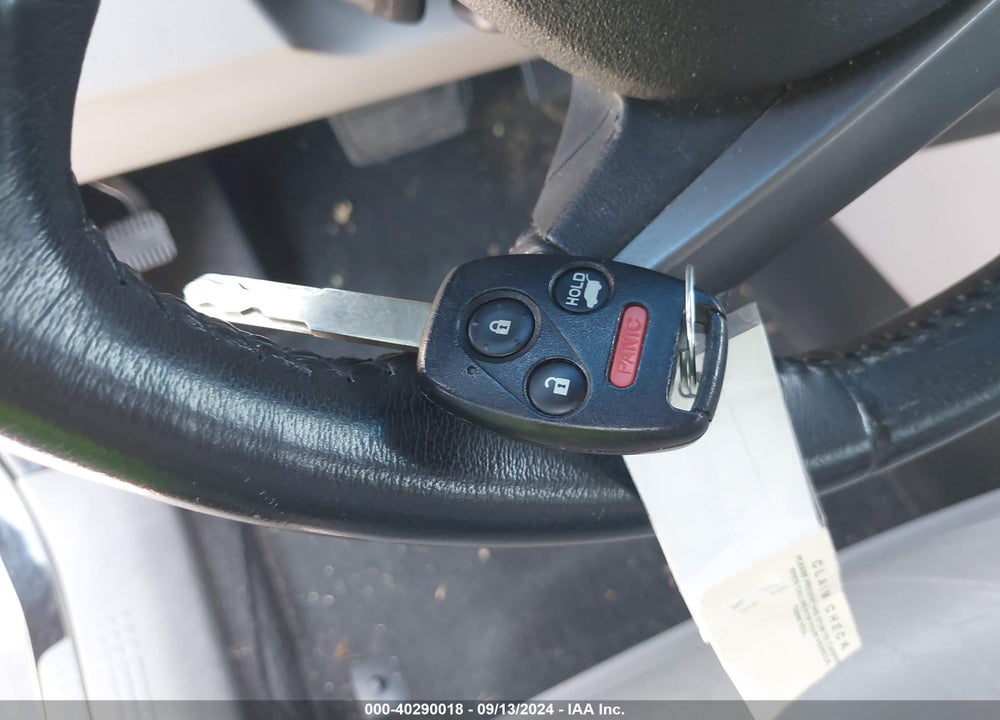 2012 HONDA PILOT EX-L VIN: 5FNYF4H72CB007144