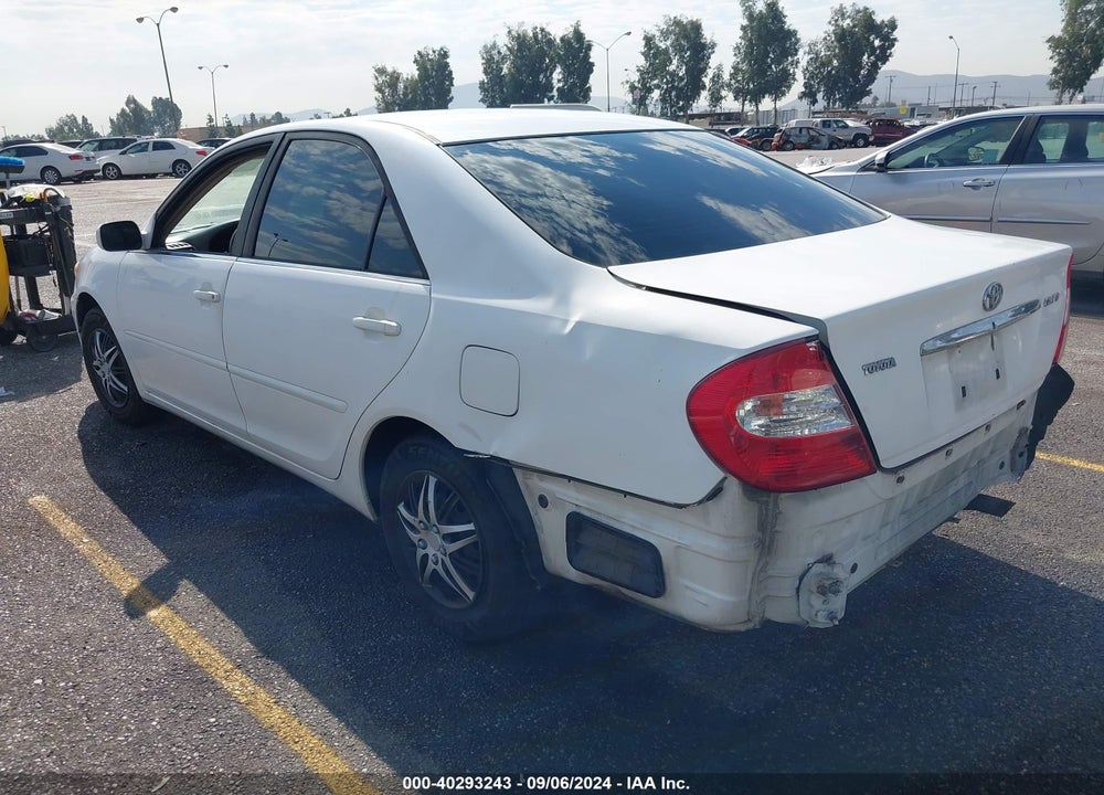 2002 TOYOTA CAMRY LE VIN: JTDBE32K120113694