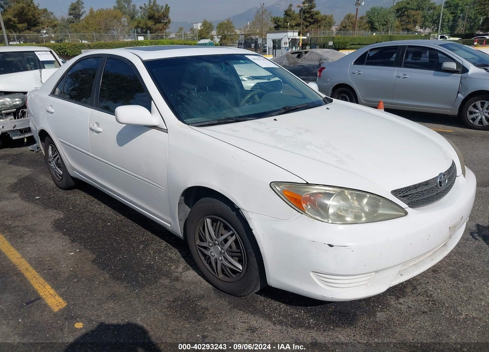 2002 TOYOTA CAMRY LE VIN: JTDBE32K120113694