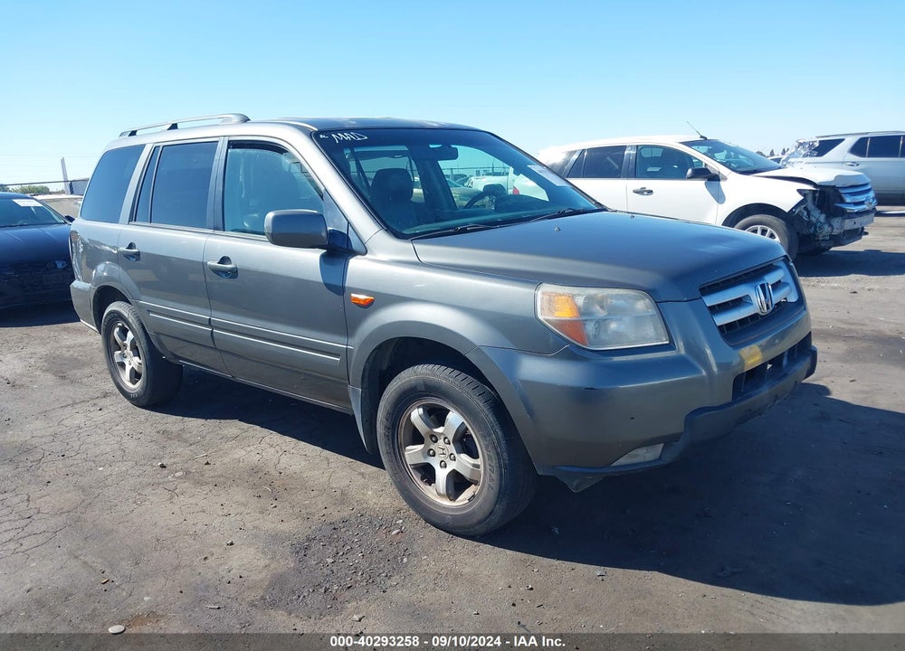 2007 HONDA PILOT EX-L VIN: 2HKYF18657H526654