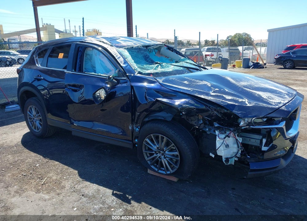 2021 MAZDA CX-5 TOURING VIN: JM3KFACM5M0334100