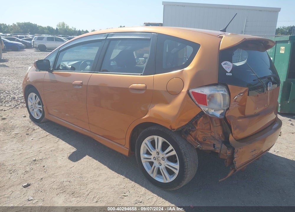 2009 HONDA FIT SPORT VIN: JHMGE88429S033698