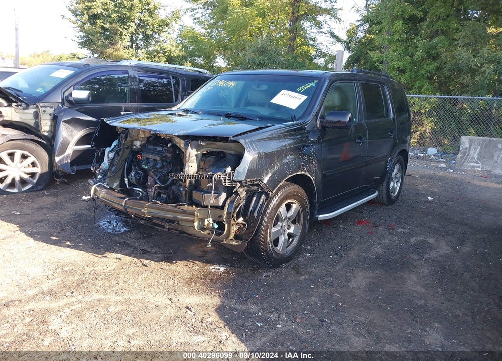 2011 HONDA PILOT EX-L VIN: 5FNYF4H50BB023386