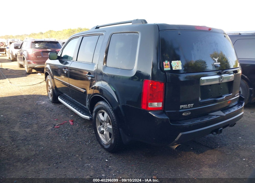 2011 HONDA PILOT EX-L VIN: 5FNYF4H50BB023386