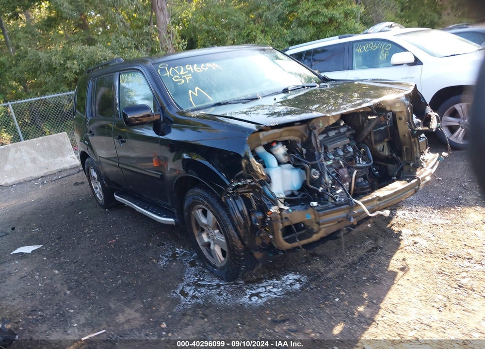 2011 HONDA PILOT EX-L VIN: 5FNYF4H50BB023386