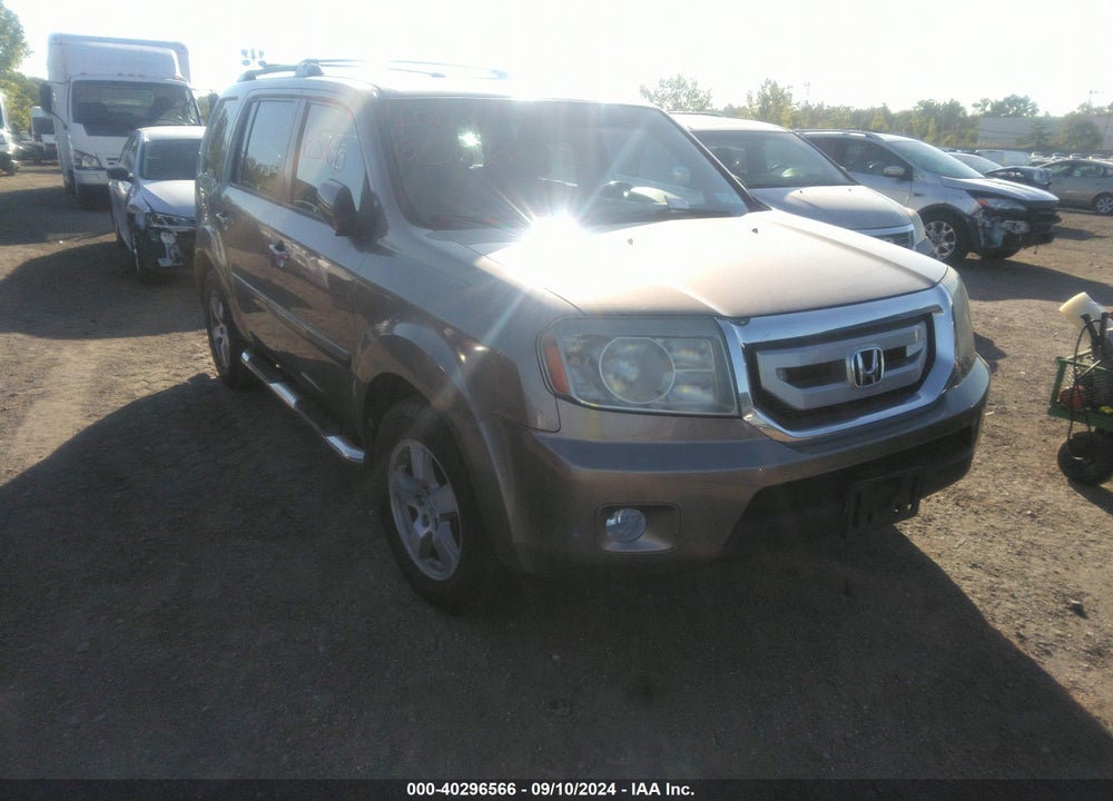 2011 HONDA PILOT EX-L VIN: 5FNYF4H65BB030939