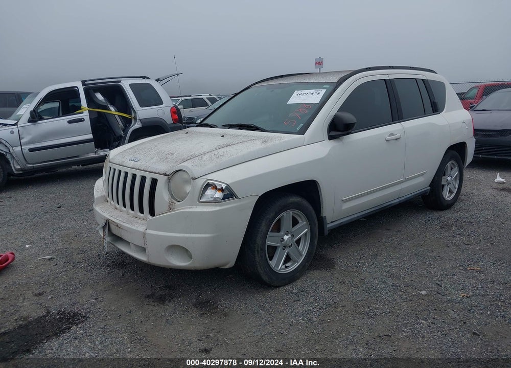 2010 JEEP COMPASS VIN: 1J4NT4FB5AD578855