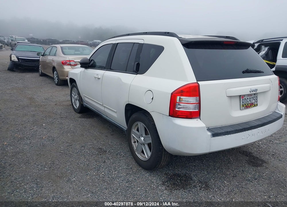 2010 JEEP COMPASS VIN: 1J4NT4FB5AD578855