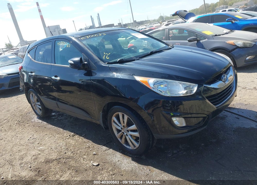 2012 HYUNDAI TUCSON GLS/LIMITED VIN: KM8JUCAC2CU382415