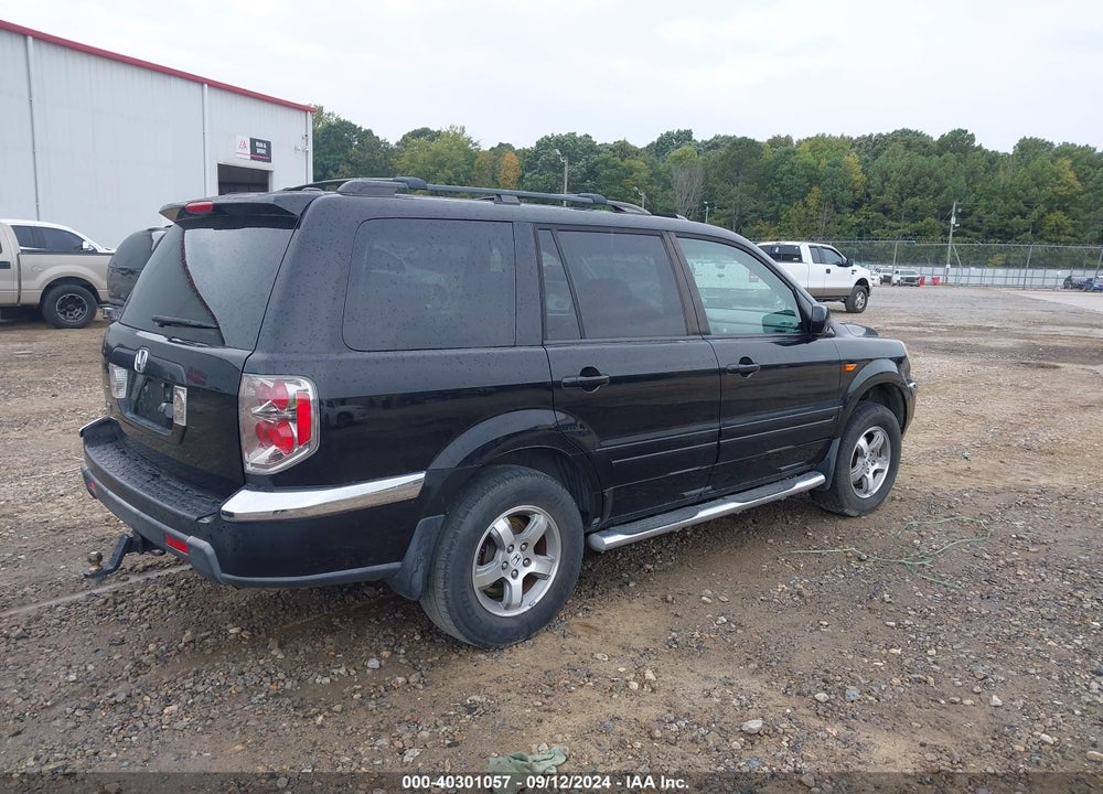 2007 HONDA PILOT EX-L VIN: 5FNYF28757B003213