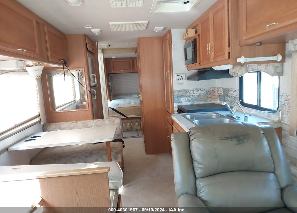 2001 FLEETWOOD STORM VIN: 1FCMF53S910A15690