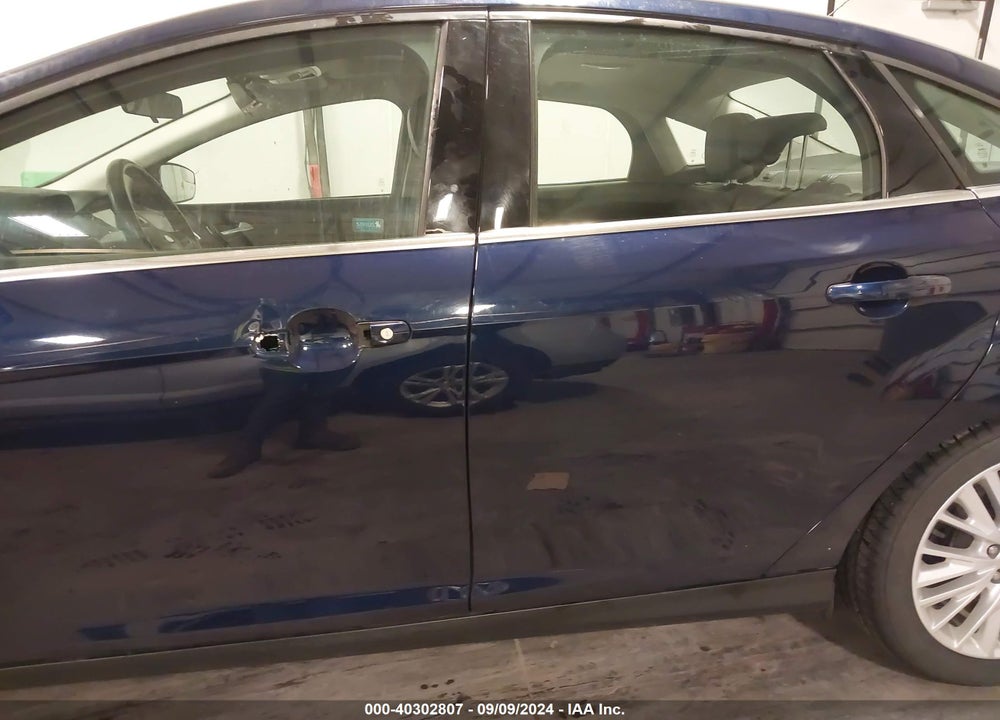 2016 FORD FOCUS TITANIUM VIN: 1FADP3J28GL297337