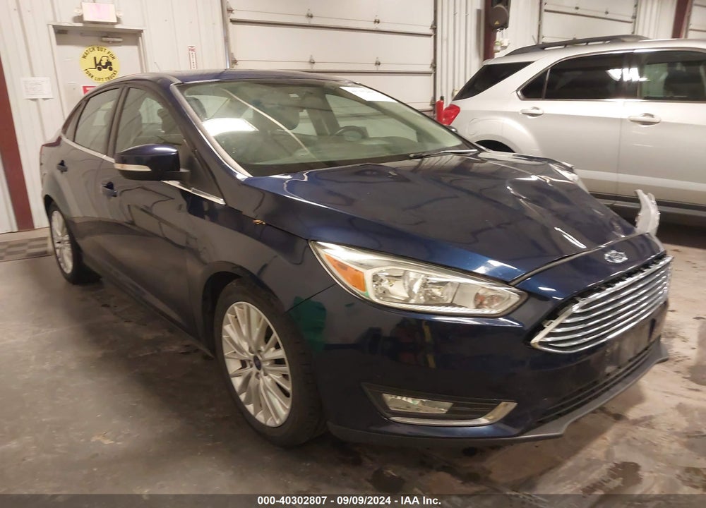 2016 FORD FOCUS TITANIUM VIN: 1FADP3J28GL297337