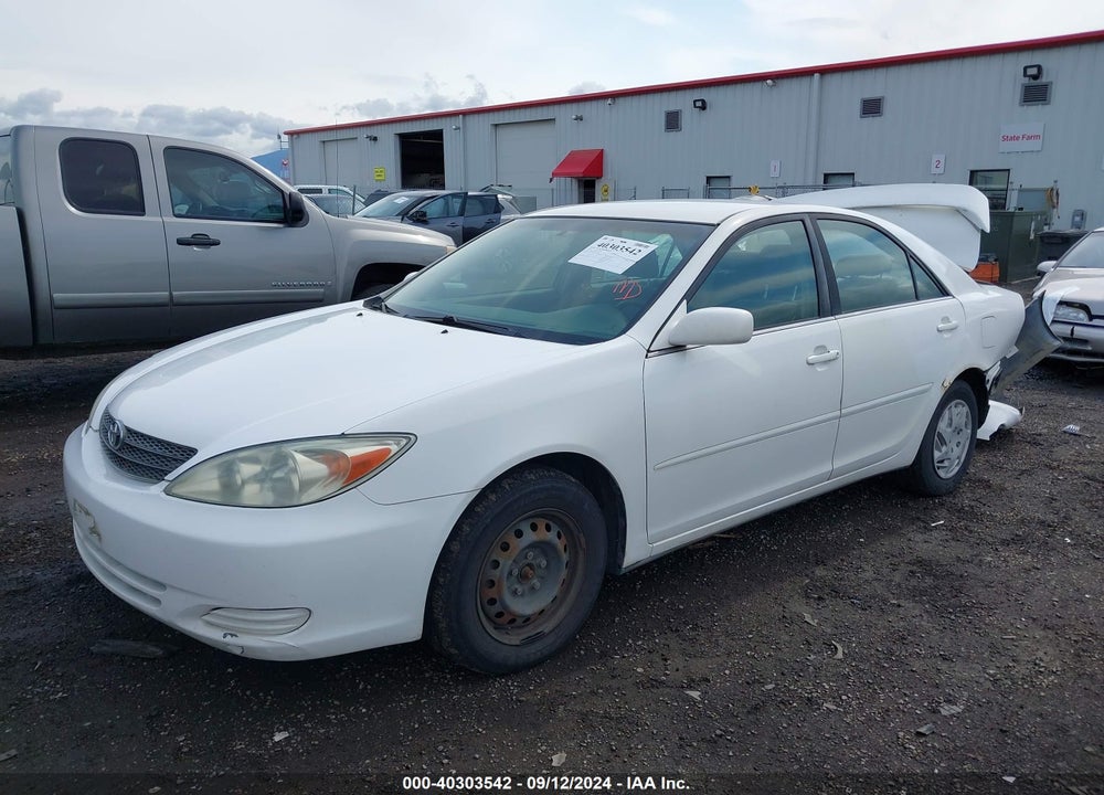 2004 TOYOTA CAMRY LE VIN: JTDBE32K940279111