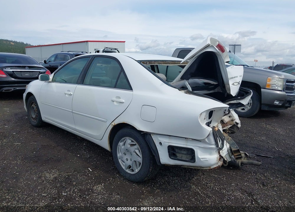 2004 TOYOTA CAMRY LE VIN: JTDBE32K940279111