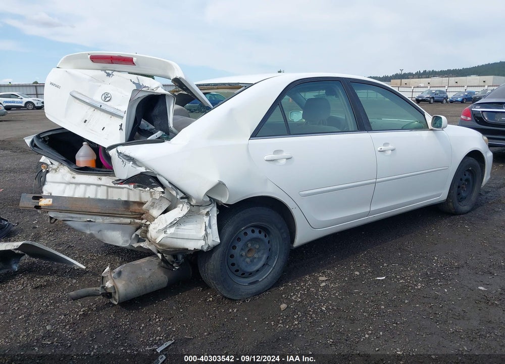 2004 TOYOTA CAMRY LE VIN: JTDBE32K940279111