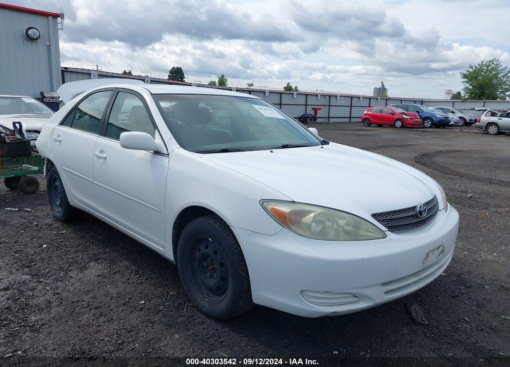 2004 TOYOTA CAMRY LE VIN: JTDBE32K940279111
