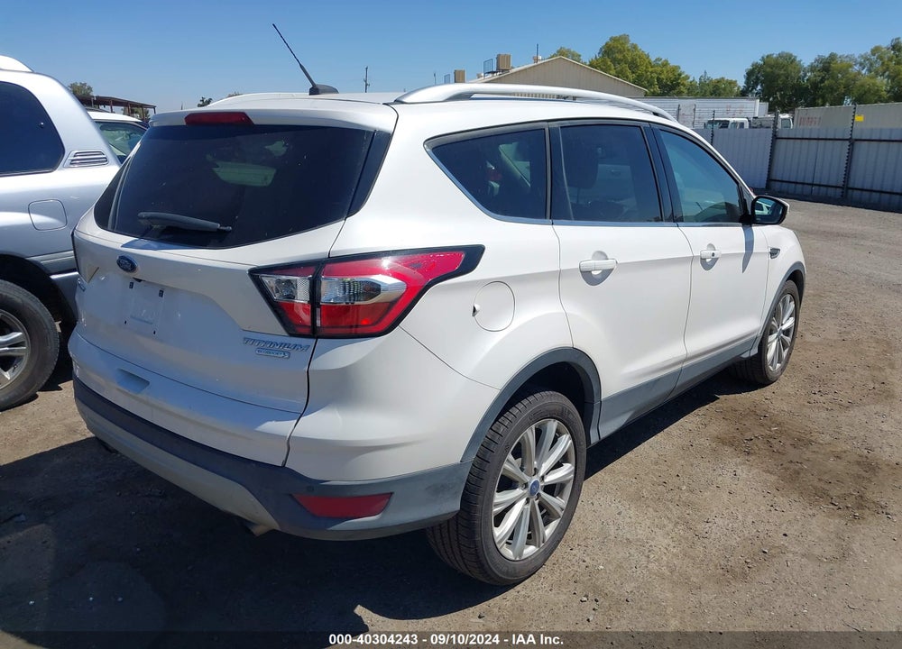 2017 FORD ESCAPE TITANIUM VIN: 1FMCU0JD7HUC67137
