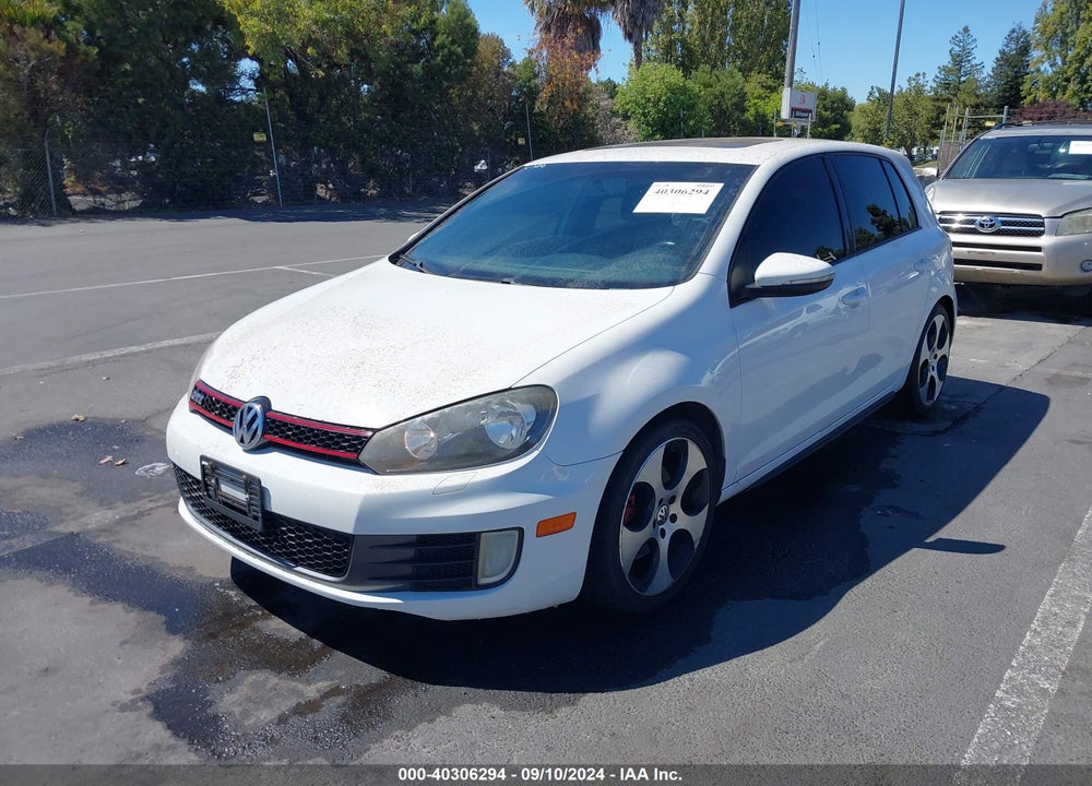2011 VOLKSWAGEN GTI 4-DOOR VIN: WVWHD7AJ1BW132370
