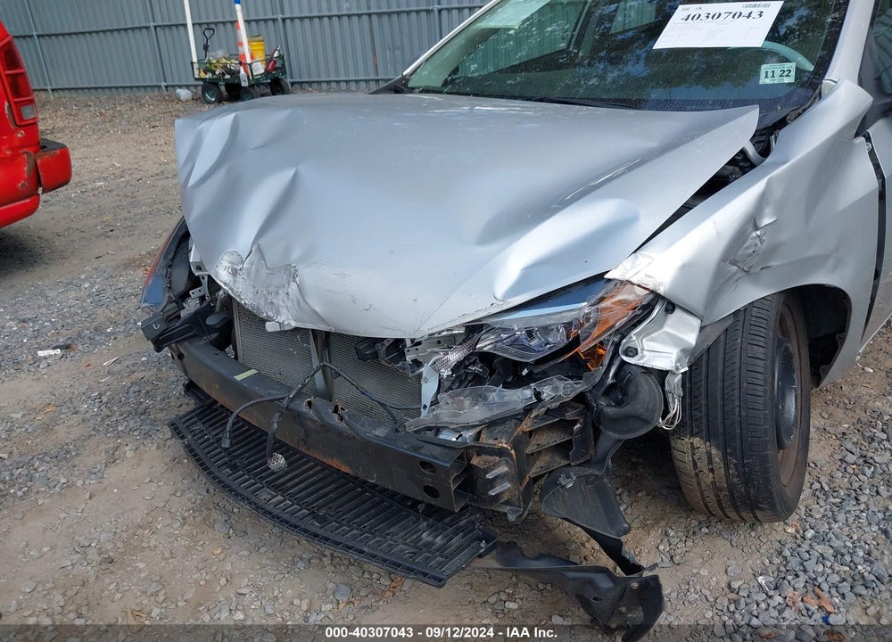 2018 TOYOTA COROLLA LE VIN: 2T1BURHE7JC011392