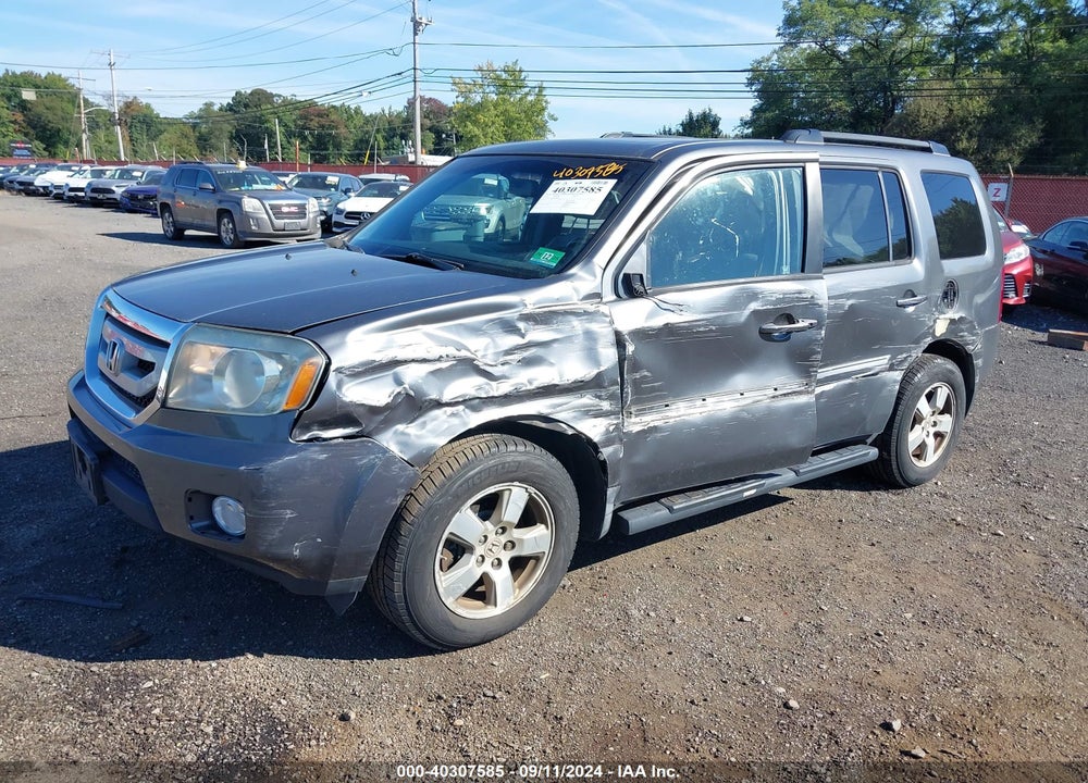 2011 HONDA PILOT EX-L VIN: 5FNYF4H55BB049384