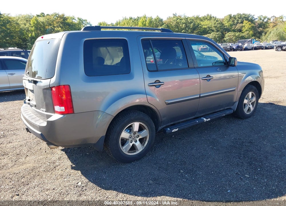 2011 HONDA PILOT EX-L VIN: 5FNYF4H55BB049384