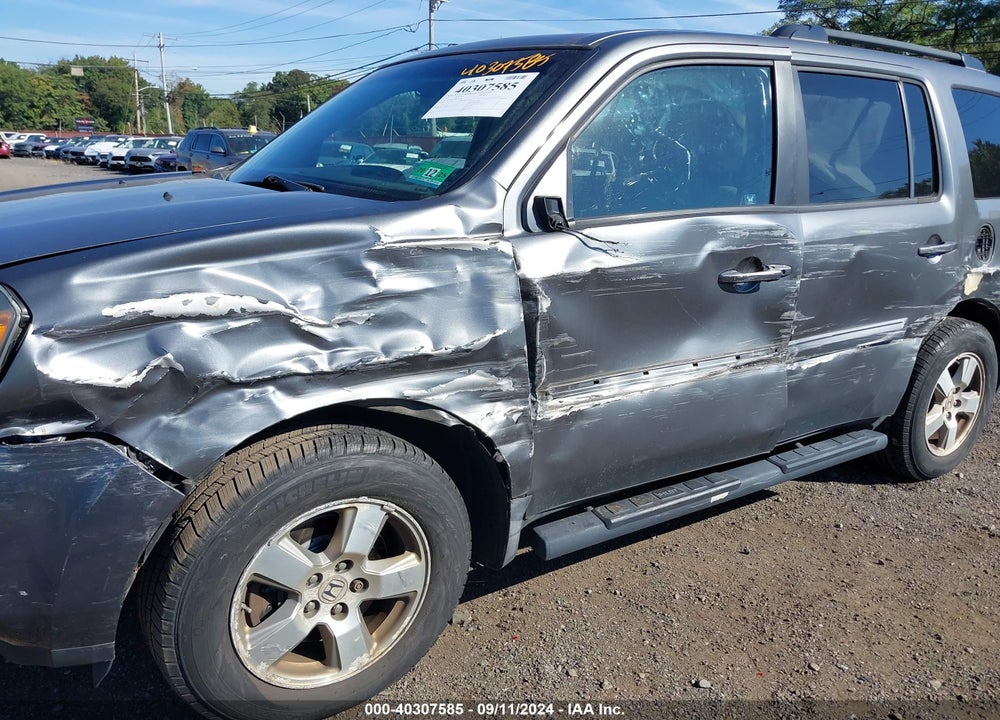 2011 HONDA PILOT EX-L VIN: 5FNYF4H55BB049384