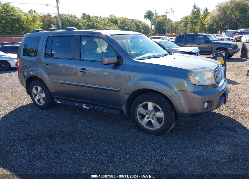 2011 HONDA PILOT EX-L VIN: 5FNYF4H55BB049384