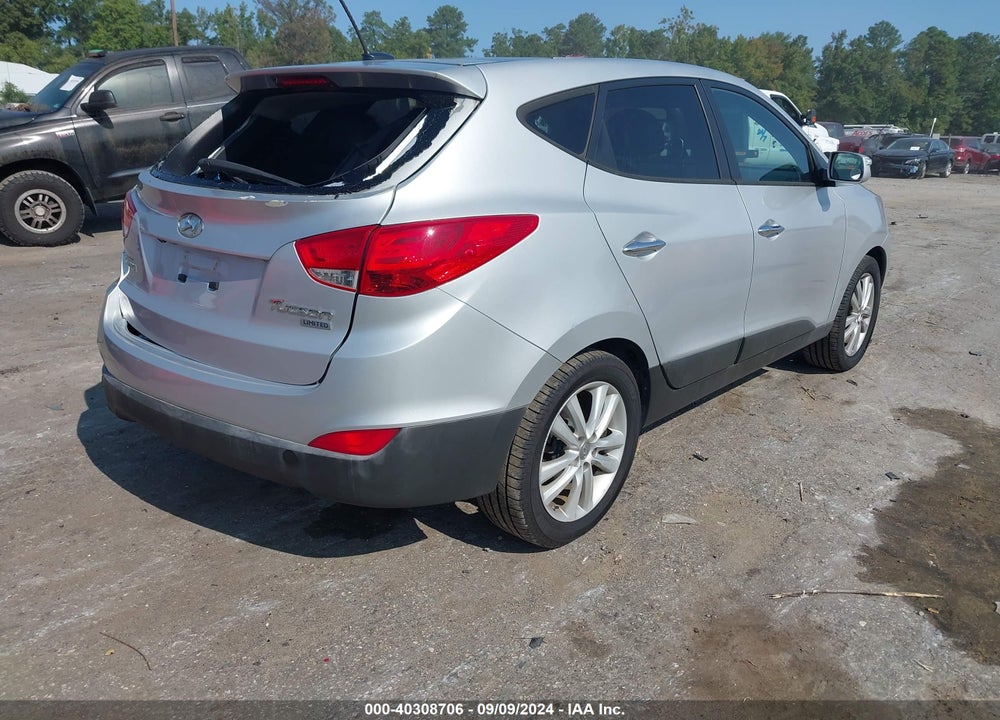 2013 HYUNDAI TUCSON LIMITED VIN: KM8JU3AC4DU548452