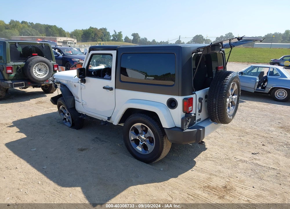 2016 JEEP WRANGLER SAHARA VIN: 1C4AJWBG5GL128645